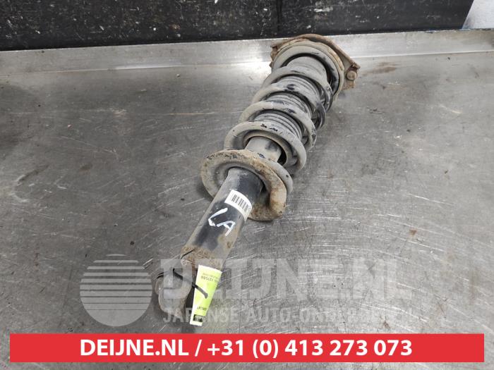 Subaru Legacy Stoßdämpferstrebe links hinten O590666