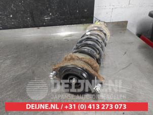 Subaru Legacy Schokdemperpoot rechts-achter O590667 foto 3