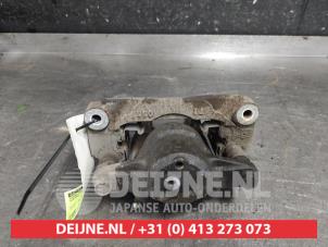 Subaru Legacy Rear brake calliper, left O590676 photo 2