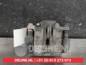Subaru Legacy Rear brake calliper, left O590676 photo 3