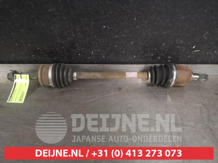 Kia Rio Aandrijfas links-voor O591196