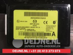Gebruikte Bluetooth module Mazda 2 (DJ/DL) 1.5 SkyActiv-G 90 Prijs € 30,00 Margeregeling aangeboden door V.Deijne Jap.Auto-onderdelen BV