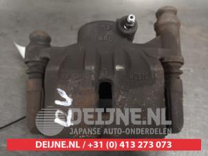 Kia Picanto Front brake calliper, left O592200 photo 2