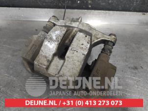 Toyota Prius Plus Rear brake calliper, left O593412 photo 2