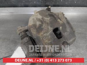 Hyundai Tucson Bremszange links vorne O593450 foto 2
