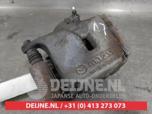 Mazda CX-3 Front brake calliper, left O594061 photo 2