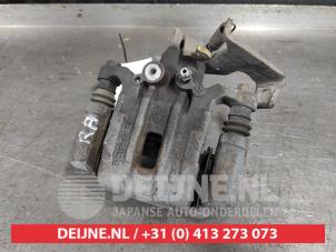 Hyundai Kona Bremszange rechts hinten O594141 foto 2