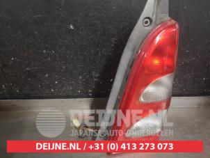 Suzuki Wagon R+ Rücklicht rechts O595338 foto 2