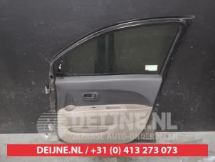 Daihatsu Sirion Front door 4-door, right O595328 photo 2