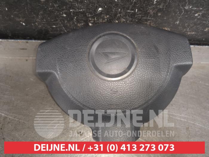 Daihatsu Cuore Airbag links (Lenkrad) O595728