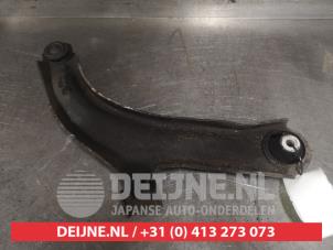 Nissan Note Querlenker unten links vorne O595767 foto 2