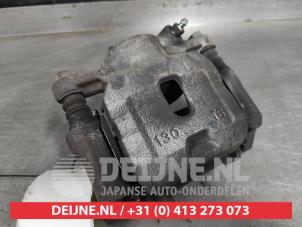 Suzuki Ignis Front brake calliper, left O595881 photo 2