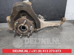 Nissan Navara Achsschenkel links vorne O596305 foto 2