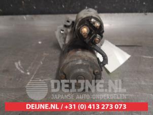 Nissan Qashqai+2 Anlasser O597805 foto 2