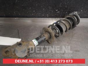 Daihatsu Cuore Front shock absorber rod, left O598105 photo 2