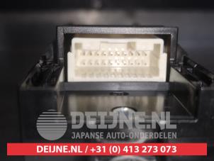 Toyota Yaris Multi-functional window switch O598957 photo 3
