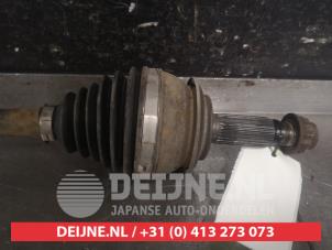 Toyota Verso-S Front drive shaft, left O599377 photo 2