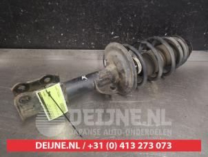 Toyota Verso-S Front shock absorber rod, right O599380 photo 2