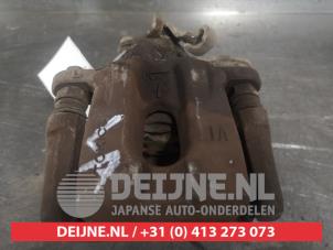 Toyota Verso-S Bremszange links hinten O599382 foto 2