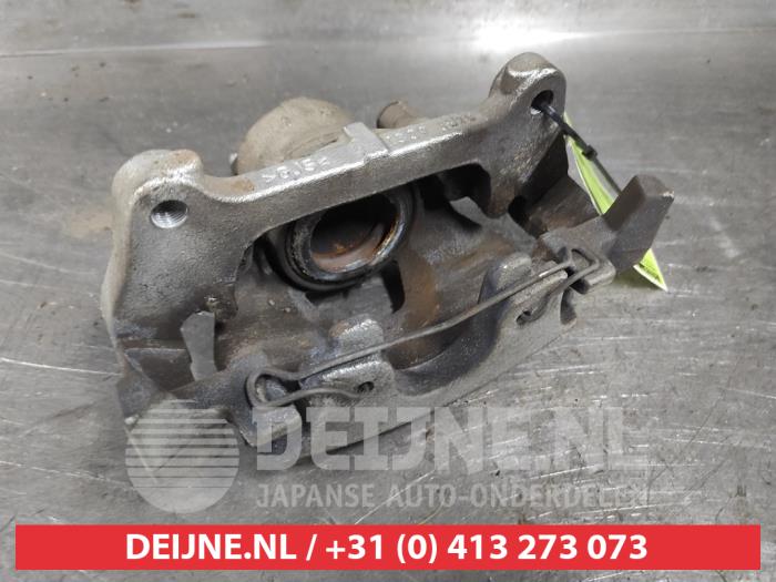 Toyota Yaris Remklauw (Tang) links-voor O599648