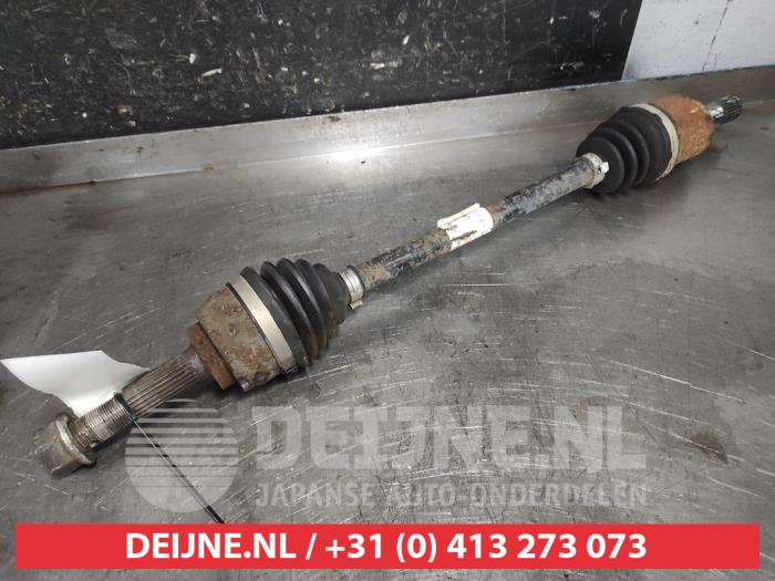 Nissan Micra Aandrijfas links-voor O599822