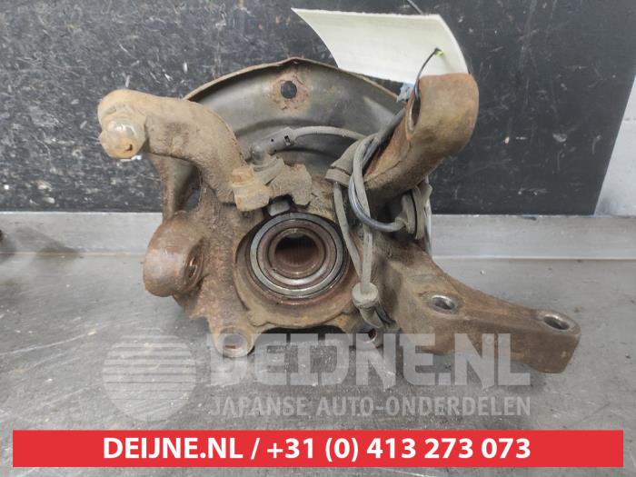 Nissan X-Trail Fusee links-voor O600065