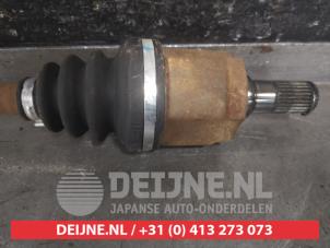 Kia Rio Aandrijfas links-voor O600705 foto 3