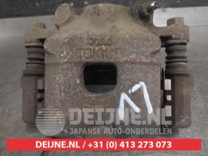Daihatsu Sirion Front brake calliper, left O600726 photo 2