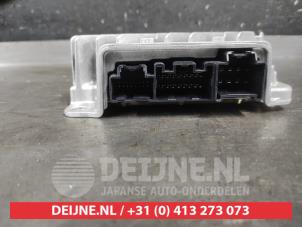 Nissan Micra Radio amplifier O601230 photo 2