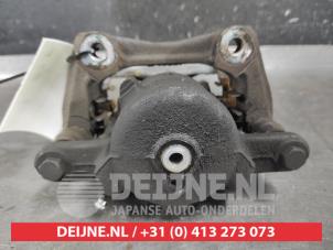 Nissan Micra Bremszange rechts vorne O601233 foto 2
