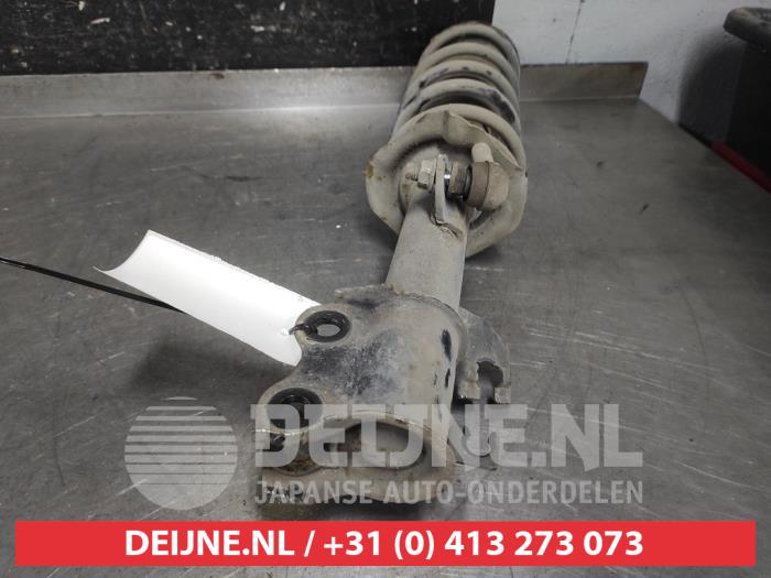 Nissan Note Schokdemperpoot links-voor O601376