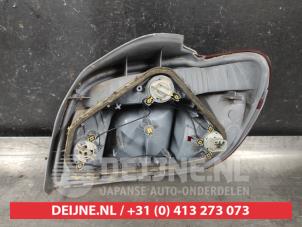 Toyota Yaris Achterlicht links O601615 foto 2