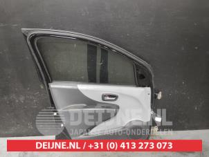 Nissan Pixo Portier 4Deurs links-voor O602514 foto 2