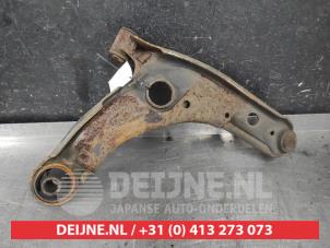 Toyota Yaris Front lower wishbone, left O603070 photo 2