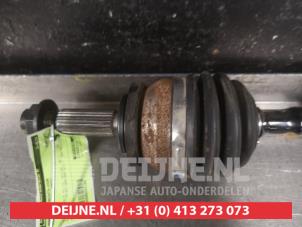 Kia Rio Aandrijfas rechts-voor O603198 foto 2