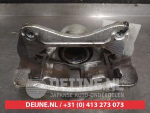 Kia Rio Remklauw (Tang) rechts-voor O603205 foto 2