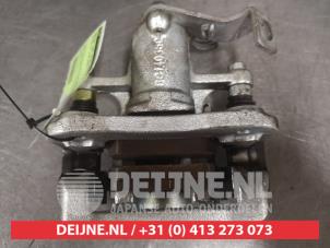 Kia Rio Remklauw (Tang) rechts-achter O603241 foto 2
