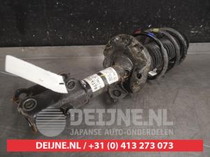 Kia Rio Schokdemperpoot rechts-voor O603243 foto 2