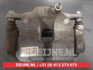 Hyundai Tucson Bremszange links vorne O603426 foto 2