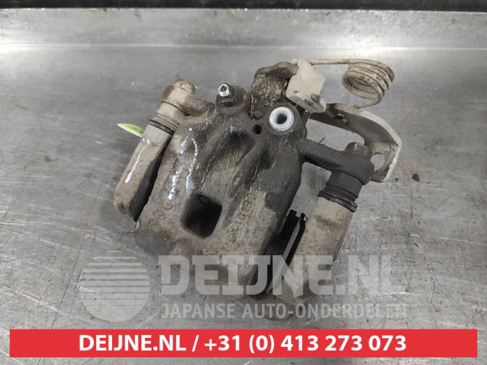 Kia Carens Remklauw (Tang) links-achter O603540