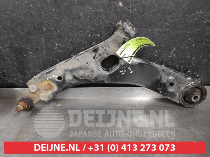 Kia Sportage Draagarm onder links-voor O604530