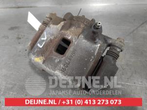 Honda Insight Remklauw (Tang) links-voor O604919 foto 2