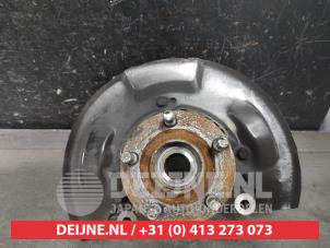 Subaru Impreza Fusee links-voor O605175 foto 2