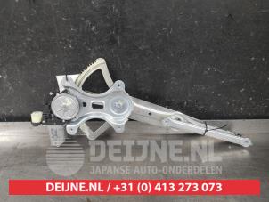 Mitsubishi L200 Ruitmechaniek achter O605515 foto 2