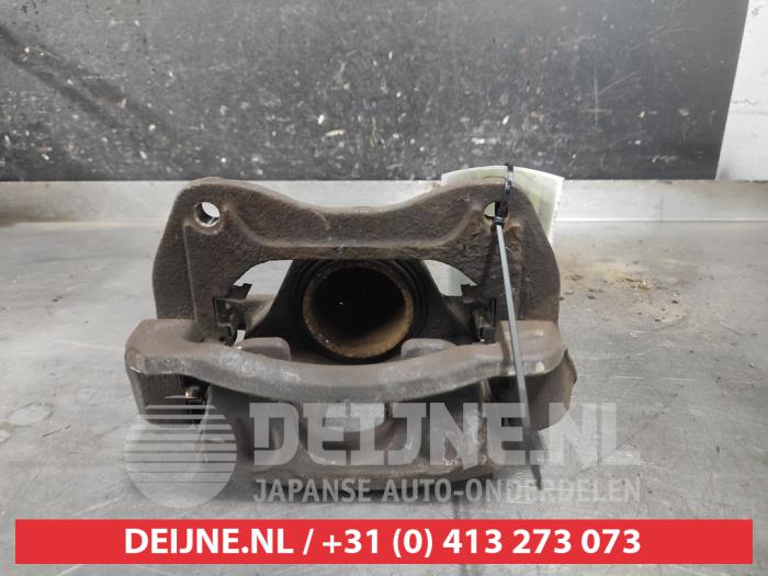 Kia Carens Front brake calliper, left O605724
