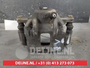 Kia Carens Front brake calliper, left O605724 photo 3