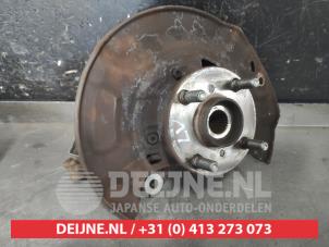 Toyota Yaris Achsschenkel links vorne O606088 foto 2