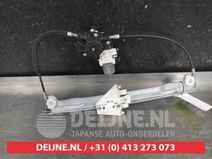 Mitsubishi Colt Ruitmechaniek 4Deurs links-achter O606615 foto 2