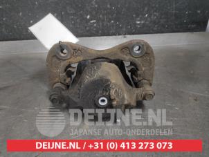 Kia Sportage Front brake calliper, left O606773 photo 2