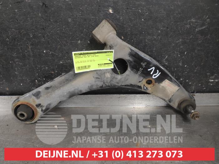 Mitsubishi Colt Front lower wishbone, right O606975